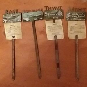 Set of NWOT metal herb stakes.